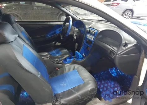 1999 Ford Mustang z USA, uszkodzony, nr VIN 1FAFP4043XF147281